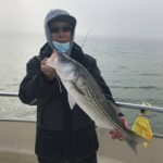 Tom Gee with Happy Hooker striper