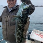 Craig Nunley of Caldwell, Idaho, holds a lingcod caught March 28 aboard the Papa B of Brookings Fishing Charters.