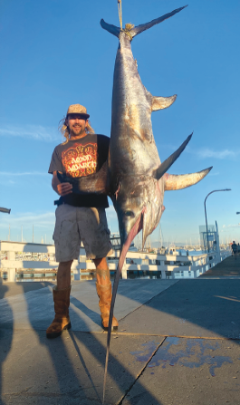 Big Swordfish on a Tiny Boat