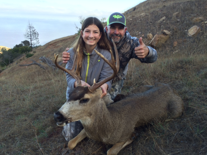 A CATALINA ISLAND buck harvested by a young hunter photo Wildlife West